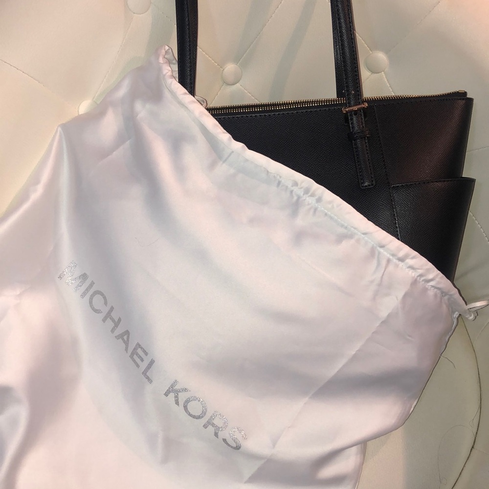 Brand new Michael Kors Bag and matching wallet.